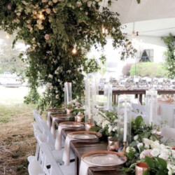 High Peak Tent, Farm Table, White Resin Chair, Crystal Chandelier, Rose Gold Glass Charger, Rose Gold Knife